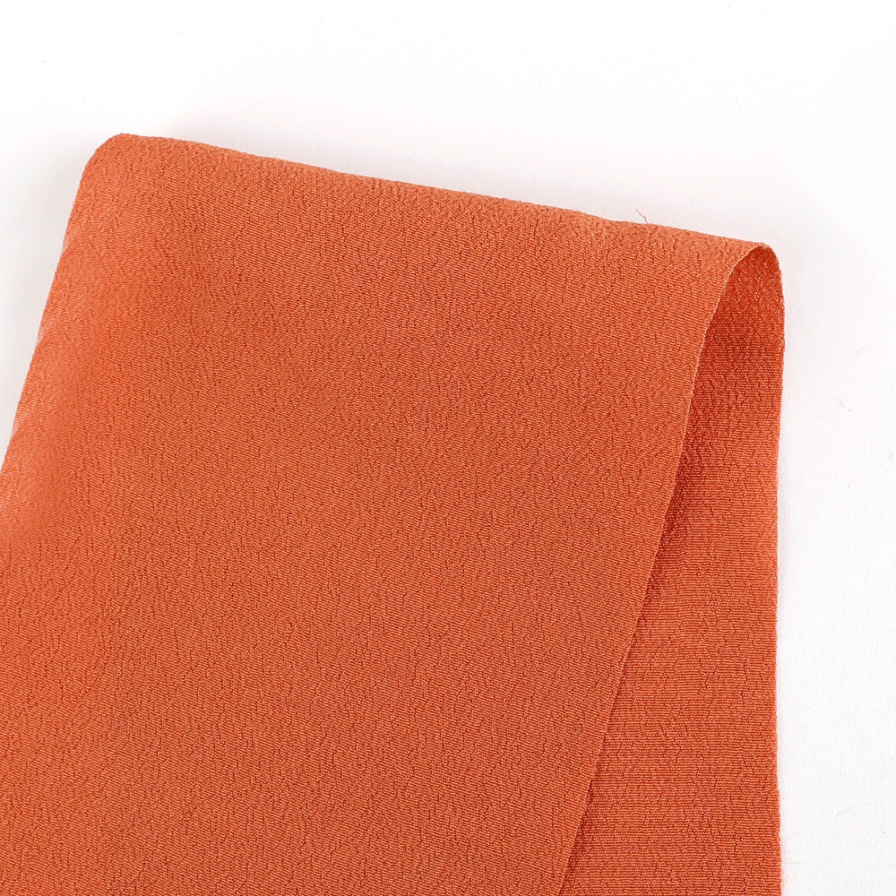 Rayon Crepe - Carrot (remnant)